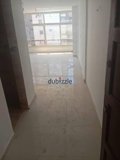 For rent, an apartment of 130 meters under the new law, first use in Al-Sa'a Square, near the first Abbas Al-Aqqad and the first Al-Nuzhah Street, Super Lux finishing, first use