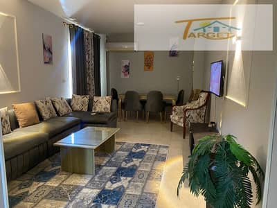Furnished apartment for rent in Madinaty (107 sqm): 2 bedrooms, 1 bathroom, custom finishing, and a garden view. Prime location in B1. Furnished apartment for rent in Madinaty (107 sqm): 2 bedrooms, 1 bathroom, custom finishing, and a garden view. Prime location in B1.