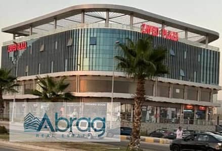 Administrative office for sale (169 sqm), ready for immediate handover, facing a main street. Installment plan available. Located at Zayed Plaza Mall,
