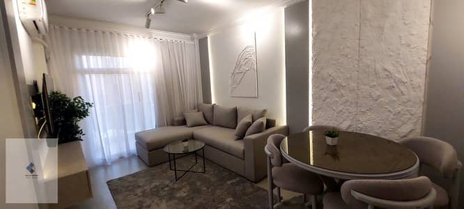 شقة للإيجار بمدينتي غرفتان نوم Garden View أمام الخدمات مباشرة بجوار بيني ماركت الدور الثاني ثاني سكن موقع مميز جاهزة للسكن قريب من المواصلات