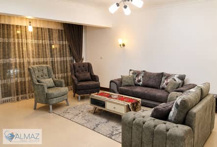 A modernly furnished duplex is available for rent in the Porto New Cairo compound in the Fifth Settlement. The compound is located just 5 minutes away