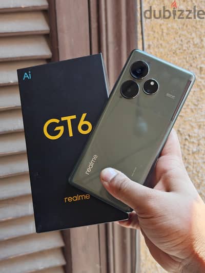 Realme GT 6 256/12 كسر زيرو بكل مشتملاته معفي ضريبه فيه قوصه فالفريم