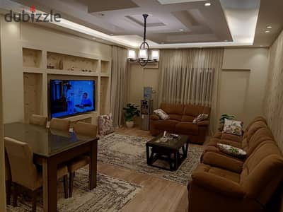 Furnished apartment for rent ultra super lux typical floor wide garden view close to Avenue Mall and gate 24 in the Ninth Phase Al Rehab 2
