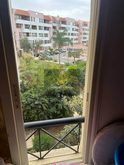 **A Great Opportunity to Own a 107 sqm Apartment in Al Rehab 1**  Located in Phase 3, in a building with an elevator, directly next to Mall 2 and Gate