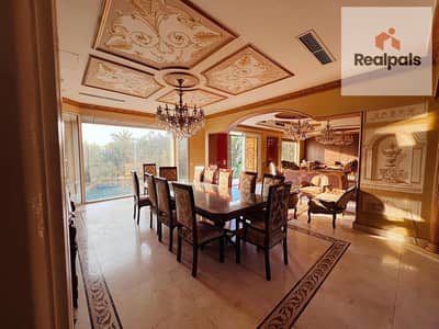 Luxury villa for sale in Grand Residence Compound – Fifth Settlement – ​​high-end finishing and swimming pool.