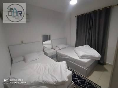 Fully furnished and air-conditioned two-bedroom apartment for rent in Al-Mustaqbal, Sheikh Zayed.