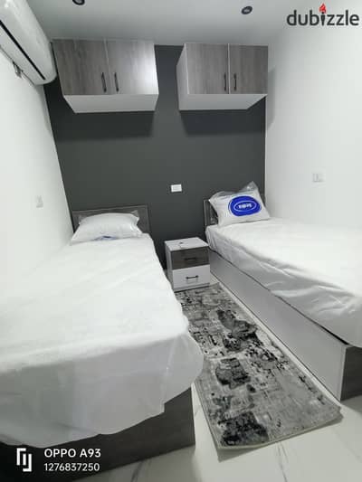 Studio for rent - Second District, 6th of October Unique studio (room and hall) in an excellent location in the Second District, next to the central axis, and only 3 minutes from Al-Hosari Mosque. Close to all services steps from Al-Tawheed and Al-Noor close to Al-Hosari bus station and transportation suitable for students, employees