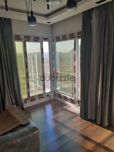 Apartment for sale in Bavaria Town Compound, Zahraa Al-Maadi, with a view in front and a façade onto the street. The sale includes kitchen and bathroom units. Area 130m, consisting of 2 bedrooms - 2 bathrooms.