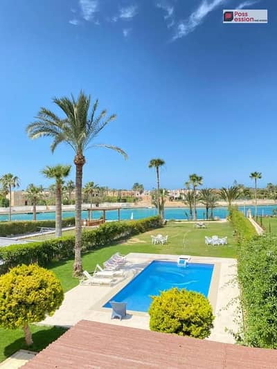 Own a 2-bedroom chalet overlooking a lagoon in Marina, North Coast, before New Alamein,
