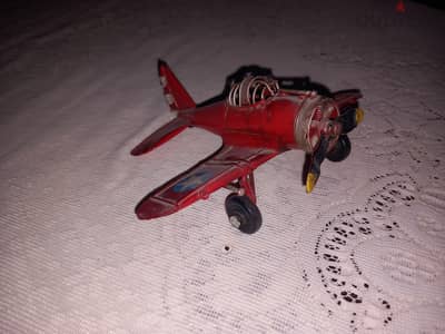 vintage WW|| style red metal plane