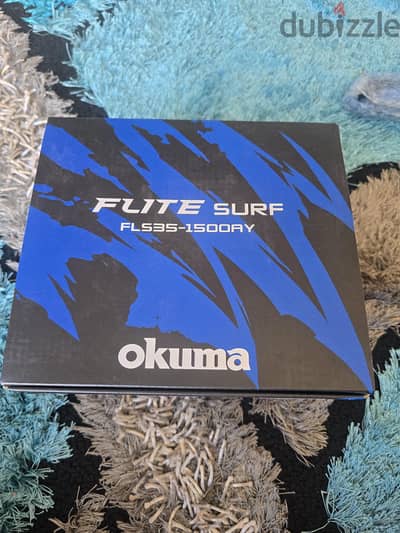 okuma  new & flute surf cast reel new