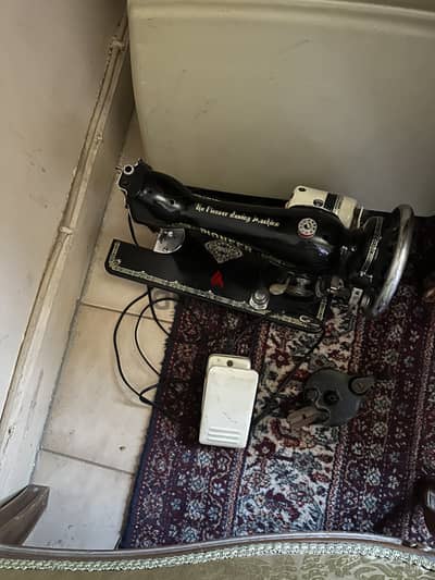 ماكينه خياطه بيونير