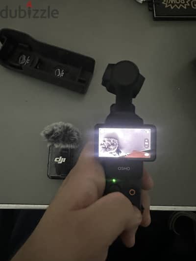 Osmo pocket 3 creator combo gimbal + mic mini 2 with a magnetic clip