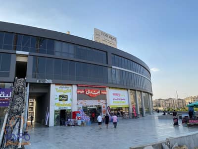 shop for rent 57m ground floor  al andalous 5th settlement new cairo