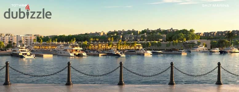 Chalet for sale on the marina with a 5% down payment at the price of the lunch in Salt Marina, Ras ElHekma, from Tatweer Misr Company, with installmet