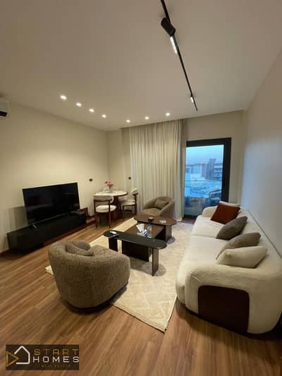 Furnished 65m² one-bedroom studio for rent in Privado, Madinaty; features a prime location and a peaceful garden view.