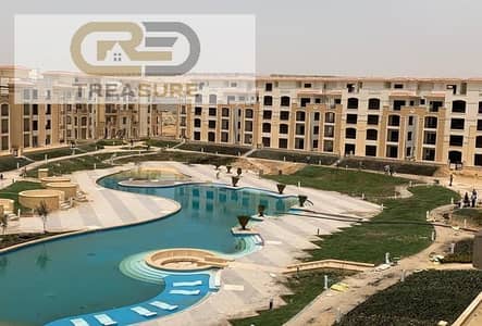 Apartment with garden for sale in Stone Residence - new cairo