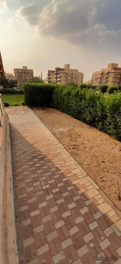 Land with a garden for sale in Wasal Al Shorouk Compound