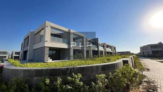 Resale chalet with a garden for sale below market price ready to move fully finish at La Vista Ras El Hekma, North Coast, featuring a direct sea view.