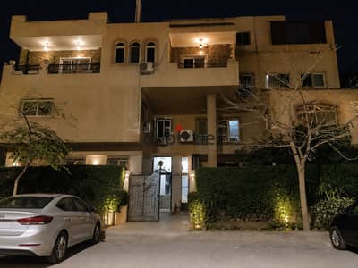 Duplex in the finest neighborhoods of the Fifth Settlement, in the second district, in front of Al-Jawwi Hospital, 300m next to the Electricity Company, with a private garden, super lux