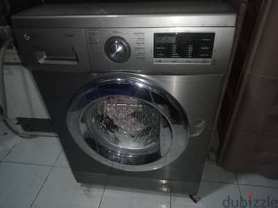 غسالة بمجفف بها عيب بسيط