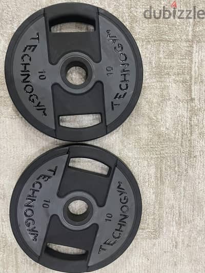 2 Barbell weight plates each 10 kg