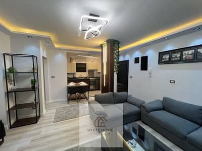 Furnished apartment for rent in Al Rehab City (99 sqm), featuring two bedrooms and a bathroom. Located in Al Rehab 1, Phase 3, near Gateway Mall and G