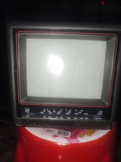 Daewoo CE-50 portable color television with an integrated AM/FM radio.