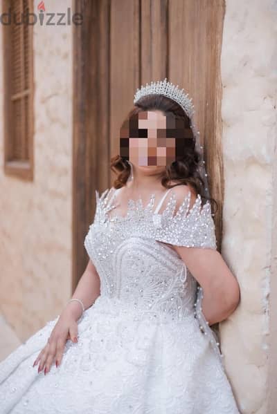 فستان زفاف اول لبسه