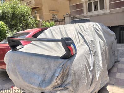 اسبويلر راكب على بيجو 405