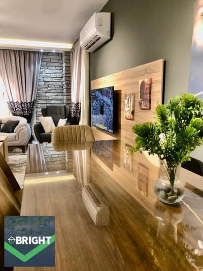 Apartment for sale in Madinaty (B12): Hotel-style finishing, fully furnished and equipped with appliances. It boasts a prime location with an open gar