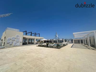A very special resale chalet for sale 45 m , immediate occupancy from the direct owner, with a direct sea view in Seashell Ras El Hekma.