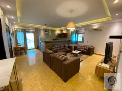 Furnished apartment for rent in Meeting Point Compound, opposite the American University. 150 sq m, 5th floor with a 100 sq m terrace. Two bedrooms an