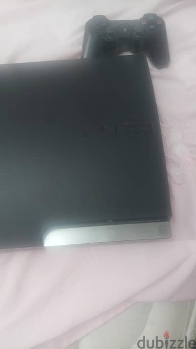 PlayStation 3 with 2 controllers