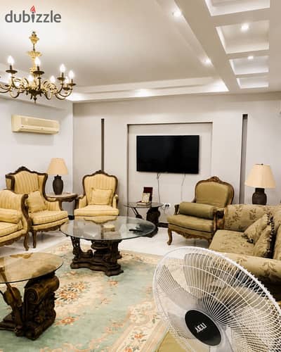 Furnished apartment for rent in Dokki near the Hunting Club overlooking the square