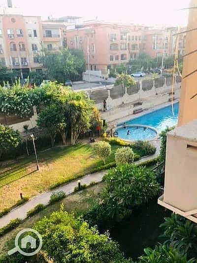Apartment for rent in Al-Juman Compound, Sheikh Zayed; includes a kitchen and a landscape view