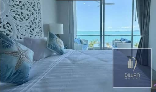 Ready ultra-super lux 1st-row studio facing towers & lagoon in New Alamein, North Coast. Huge cash discount.