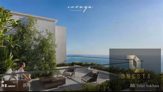 Studio chalet for sale, fully finished with air conditioning and kitchen, directly on the sea, with a 40% discount and a down payment starting from 5%