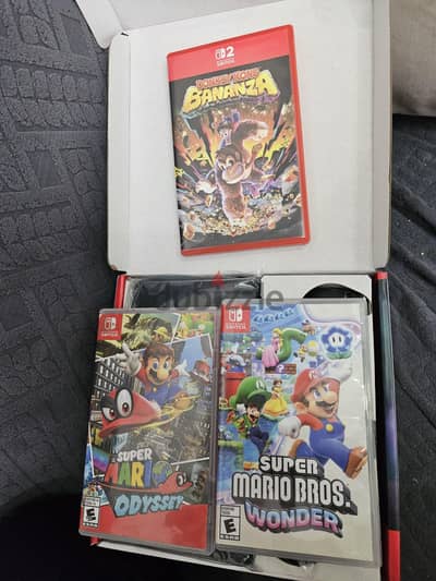 Nintendo Switch 2 (Mario Kart World) + 3 more games