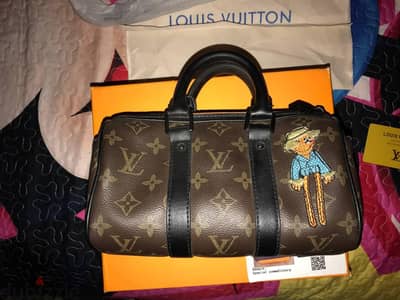 شنطه lv