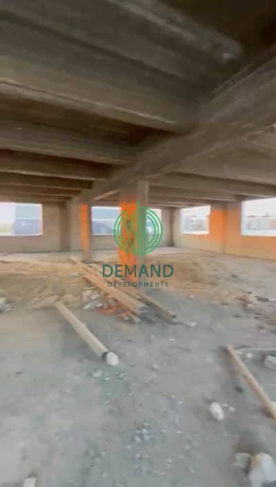 Car maintenance center for rent directly on Gamal Abdel Nasser Axis, at the corner of the central axis in 6 October