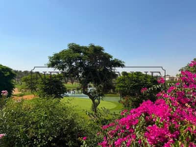 Standalone Villa with swimming pool direct on lake in a very prime location for sale in Katameya Dunes New Cairo developed by Starlight developments