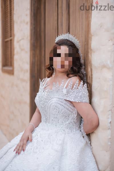 فستان زفاف لبسه واحده