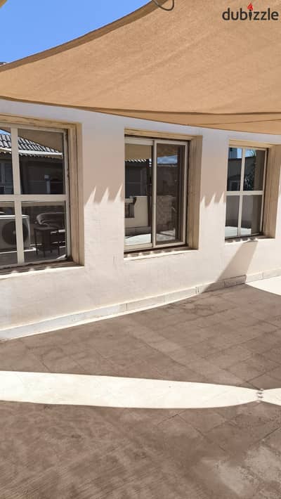 Furnished air-conditioned room apartment with a roof in Al Yasmin Compound, Sheikh Zayed