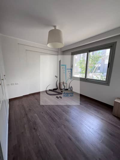 Ground-floor apartment with a garden for rent in Palm Parks Compound, 6th of October City (133 sqm). Includes kitchen and air conditioning units.
