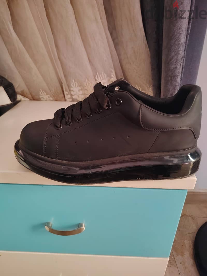 black Alexander mcqueen mirror 2