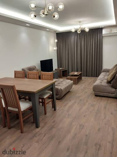 Furnished apartment for rent 119 sqm fully custom luxury finishings and elegant furniture next to Avenue Mall in the Tenth Phase Al Rehab 2