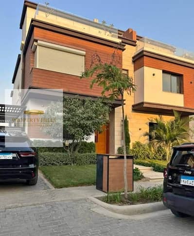 Standalone villa for sale at cash price in Azar 2 compound in the heart of the Golden Square directly on Mohammed Bin Zayed axis with a view of the landscape