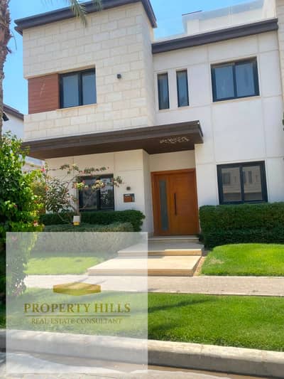 The most luxurious and distinctive corner villa at the old price with a down payment of 1,165,000 only in the compound of villas in view of landscaped scenery and cleanliness and services all day beside Mivida and the Ninety azzar