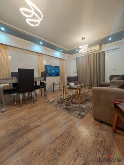 Furnished apartment for rent 99 sqm super lux finishings plaza view next to Avenue Mall services and the mosque in Phase 8 in Al Rehab